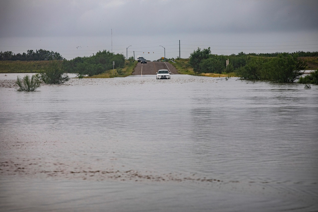Car approaching flood waters